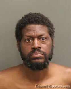Mugshot of DARRYLRIEKO BERNARD ROBINSON booked in Orange County, Florida on May 6, 2026