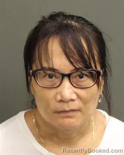Mugshot of LIHUA XU booked in Orange County, Florida on May 7, 2026
