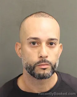 Mugshot of CHRISTIAN DE JESUS JARQUIN booked in Orange County, Florida on May 7, 2026