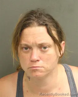 Mugshot of GINA MARIE MULLINS booked in Orange County, Florida on May 7, 2026