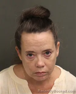 Mugshot of PAULA HALLECKS WEBER booked in Orange County, Florida on May 7, 2026