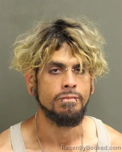 Mugshot of CHRISTIAN ALEXANDER JR SUAREZ booked in Orange County, Florida on May 7, 2026