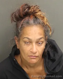 Mugshot of DESIREE ALICEA booked in Orange County, Florida on May 7, 2026
