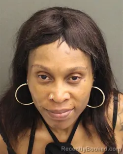 Mugshot of ANGELA DENISE MOORE booked in Orange County, Florida on May 8, 2026