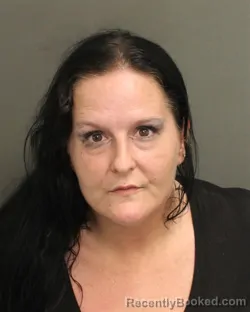 Mugshot of KELLY MARIE MCRAE booked in Orange County, Florida on May 8, 2026