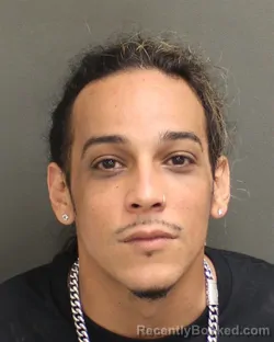 Mugshot of JUSTIN DEJESUS booked in Orange County, Florida on May 8, 2026