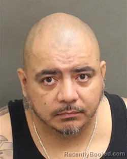 Mugshot of ALBERTO JR CARBAJAL booked in Orange County, Florida on May 9, 2026
