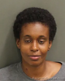 Mugshot of SUSANNA KEBEDE DEMISSIE booked in Orange County, Florida on May 9, 2026