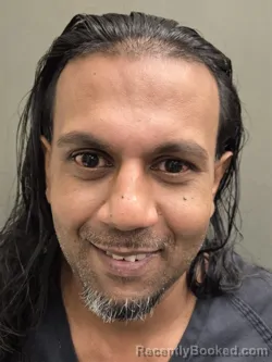 Mugshot of ROHAN KALIKA booked in Orange County, Florida on May 9, 2026