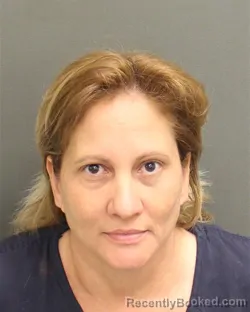 Mugshot of ESTHER IVETTE TORRES booked in Orange County, Florida on May 9, 2026
