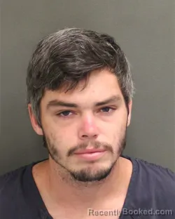 Mugshot of BENJAMIN JACOB SIVADON booked in Orange County, Florida on May 10, 2026