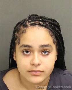 Mugshot of JAZMIN DENISE HARRELL booked in Orange County, Florida on May 10, 2026