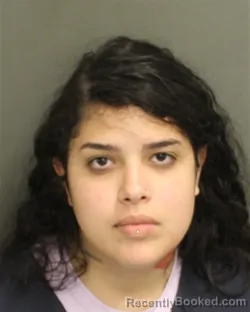 Mugshot of RAQUEL DEOLIVERA booked in Orange County, Florida on May 11, 2026