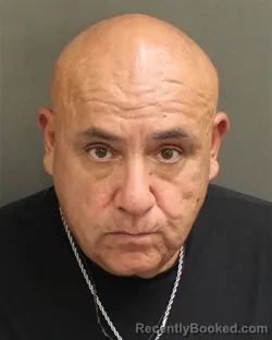 Mugshot of JOHN PAVAO booked in Orange County, Florida on May 11, 2026