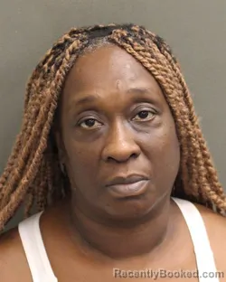 Mugshot of MIGNON DICOLE BOSTIC booked in Orange County, Florida on May 12, 2026