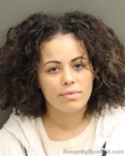 Mugshot of CORINA SIARA REYES booked in Orange County, Florida on May 12, 2026