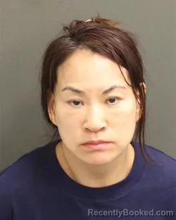 Mugshot of XIU YUN LI booked in Orange County, Florida on May 12, 2026