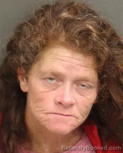 Mugshot of MELINDA MURDIES WEAVER booked in Orange County, Florida on May 13, 2026