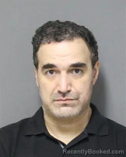 Mugshot of JUAN PABLO CABRAL booked in Orange County, Florida on May 13, 2026