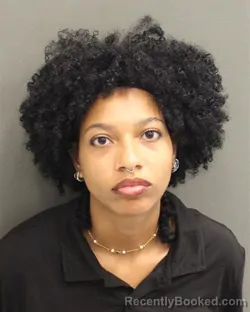 Mugshot of KARINNA EDITHA JOHNSON booked in Orange County, Florida on May 13, 2026