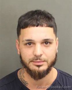 Mugshot of JOSE ENRIQUE GALLEGO booked in Orange County, Florida on May 13, 2026