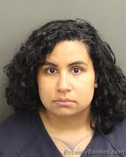 Mugshot of AIMEE MERCEDES TAVERAS booked in Orange County, Florida on May 13, 2026