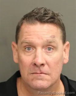 Mugshot of RYAN M WALL booked in Orange County, Florida on May 14, 2026