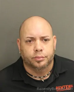 Mugshot of RAYMOND SANTIAGO NEWTONRIVERA booked in Orange County, Florida on May 14, 2026