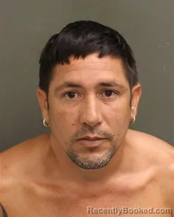 Mugshot of CARLOS RUBEN GOMEZJIMENEZ booked in Orange County, Florida on May 14, 2026