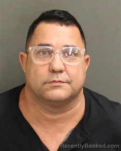 Mugshot of CARLOS LUIS DIAZJIMENEZ booked in Orange County, Florida on May 14, 2026