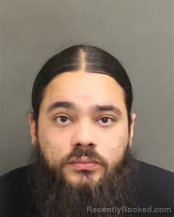 Mugshot of CHRISTIAN JAVIER MUNOZRAMOS booked in Orange County, Florida on May 14, 2026