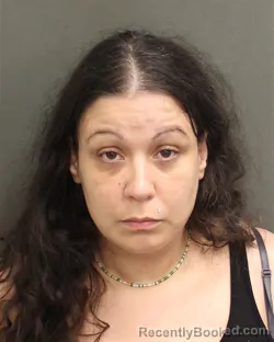 Mugshot of GLORIA EVETTE ROLON booked in Orange County, Florida on May 15, 2026