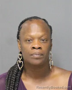 Mugshot of ACQUANETTE LAQUANA BENJAMIN booked in Orange County, Florida on May 15, 2026