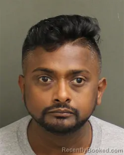 Mugshot of SUNDER CHEBIAM booked in Orange County, Florida on May 15, 2026