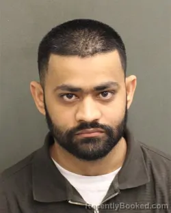 Mugshot of AKSHAY JAYANTIBHAL PATEL booked in Orange County, Florida on May 15, 2026