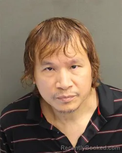 Mugshot of CHUONG CANH TRAN booked in Orange County, Florida on June 2, 2026