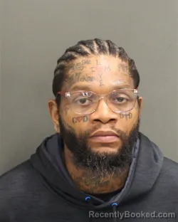 Mugshot of JONATHAN CEDRIC BATTLE booked in Orange County, Florida on June 4, 2026