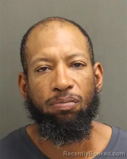 Mugshot of ZANI K MENSAH booked in Orange County, Florida on June 4, 2026