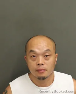 Mugshot of CHUNTING ZHU booked in Orange County, Florida on June 5, 2026