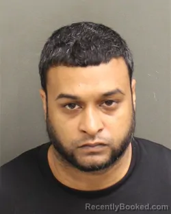 Mugshot of CHRISTOPHER MOHAN GUPTAR booked in Orange County, Florida on June 7, 2026