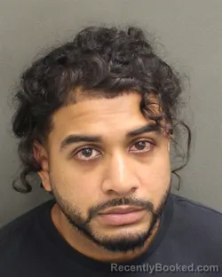 Mugshot of AZEEM MUHAMMAD ALLI booked in Orange County, Florida on June 9, 2026