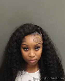 Mugshot of JUDEA DOMINIQUE SANDERS booked in Orange County, Florida on June 9, 2026