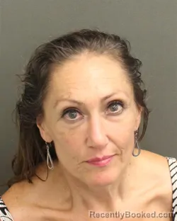 Mugshot of SARAH PAULINE MESSER booked in Orange County, Florida on June 11, 2026
