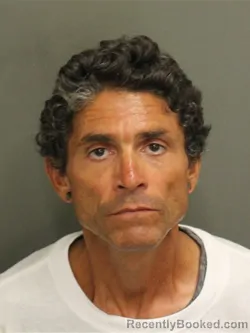 Mugshot of ENRIQUE QUINONES booked in Orange County, Florida on June 11, 2026