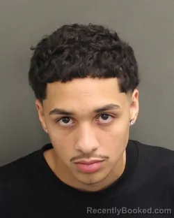 Mugshot of JAYDUM ALEXANDER MARTINEZ booked in Orange County, Florida on June 13, 2026
