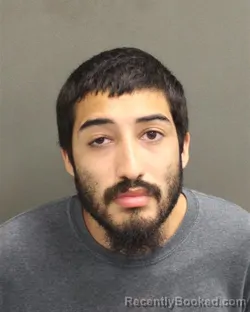 Mugshot of JOHNNY MANUEL HERNANDEZ booked in Orange County, Florida on June 14, 2026