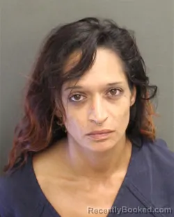 Mugshot of ANGELA LUCILLE COX booked in Orange County, Florida on June 14, 2026