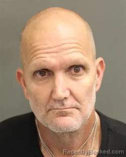 Mugshot of CHRISTOPHER JAMES PLETKA booked in Orange County, Florida on June 14, 2026