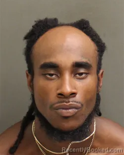 Mugshot of JOSIAH WILLIAM CHAR MCCOY booked in Orange County, Florida on June 14, 2026