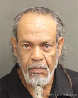 Mugshot of CHAMRAJ PERSAUD booked in Orange County, Florida on June 14, 2026